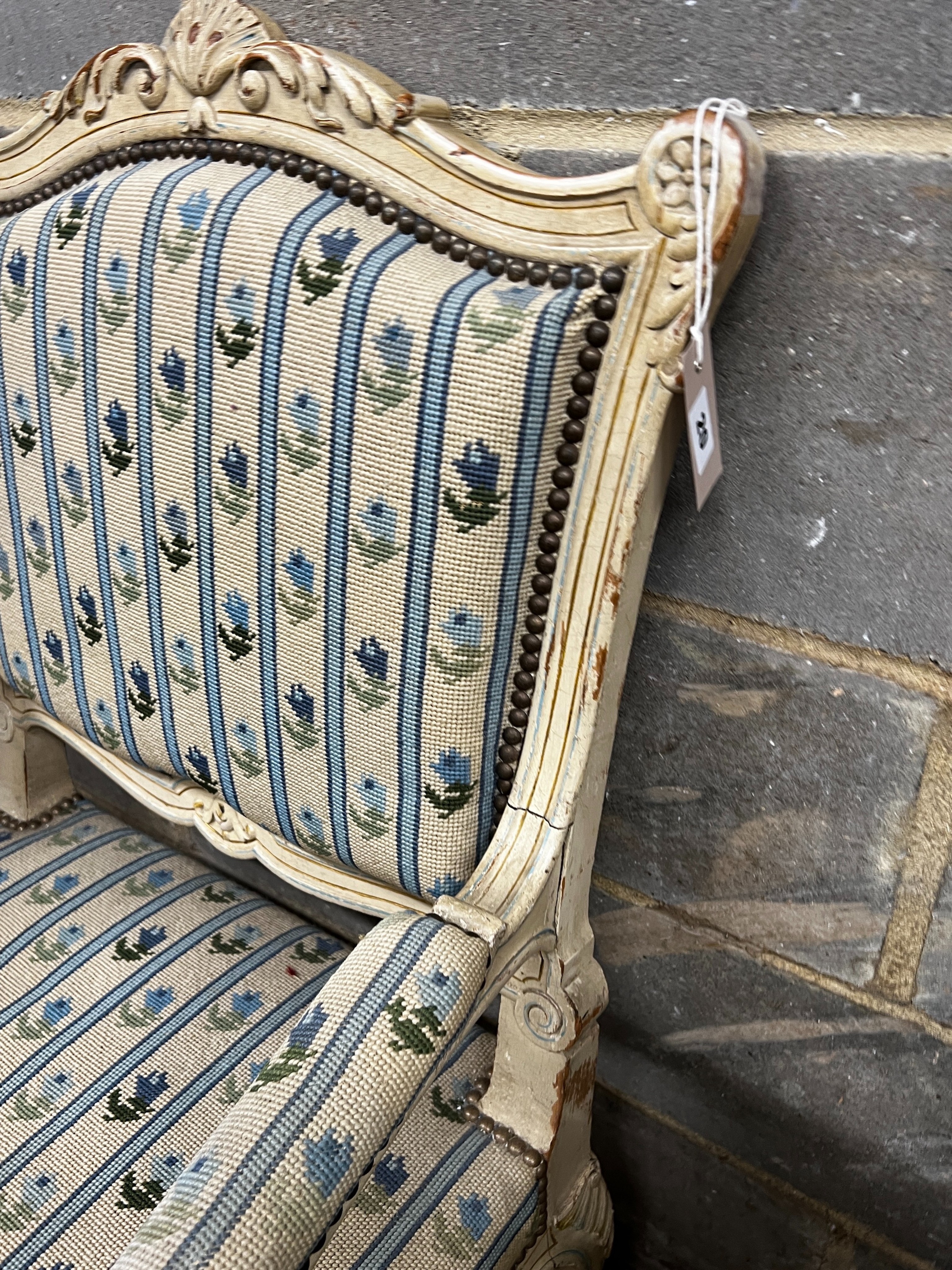 A French painted elbow chair with tapestry upholstery, width 64cm, depth 70cm, height 94cm